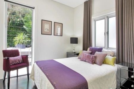 Fully Furnished Three-Bedroom Designer Home - Photo 2