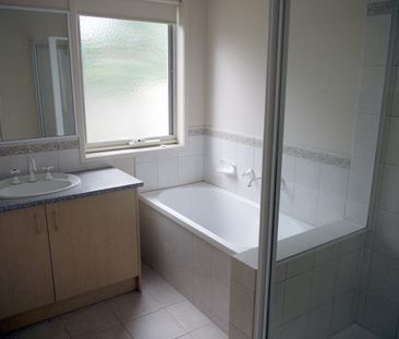 Spacious Three-Bedroom Unit in a Quiet Court Location - Photo 5