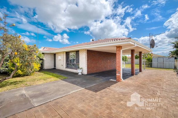 IDEALLY LOCATED FAMILY HOME - Photo 1