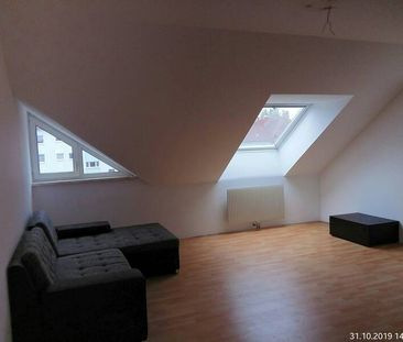 Helle 2 Zimmer Dachgeschosswohnung mit Loggia und zugehörigen Stell... - Foto 4