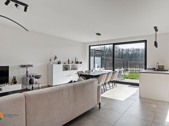 Energiezuinig gelijkvloers appartement met terras, tuintje en ondergrondse parkeerplaats - Photo 1