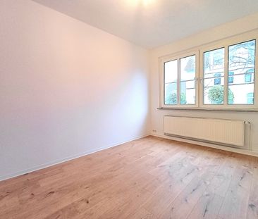 Hübsche Erdgeschosswohnung mit Badewanne - Foto 1