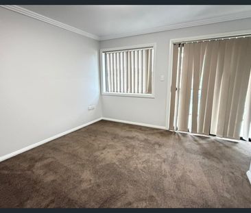 Modern 4-Bedroom, 3-Bathroom Home – Freshly Painted with New Carpets - Photo 4