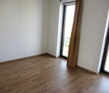 Energiezuinig appartement met 2 SLPK + terras + parking te MACHELEN - Photo 4