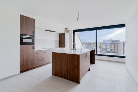 Hoogwaardig afgewerkt nieuwbouw duplex-appartement met 2 slaapkamers, terras en carport - Photo 3