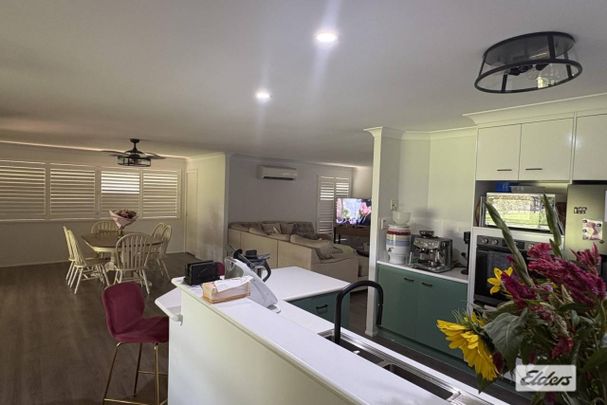 NEW TO THE RENTAL MARKET – SPACIOUS 4-BEDROOM BRICK HOME ON ¾ ACRE - Photo 1