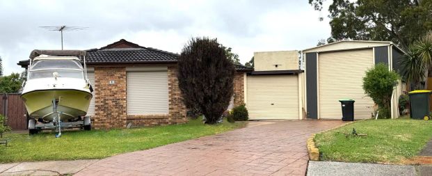 “Unique Family Home in Prime Quakers Hill Location!” - Photo 1