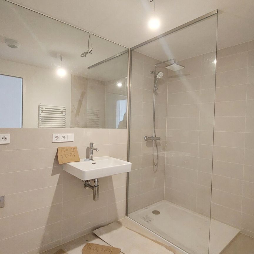 Erstbezug im VIENNA TWENTYTWO bei der U1 *Rooftop-Pool inklusive* - Photo 1