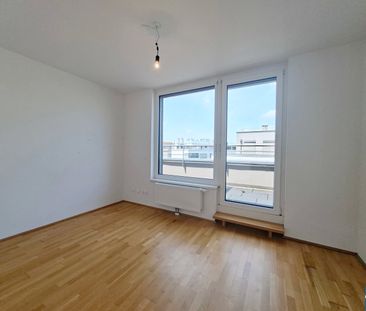 Traumhafte Dachgeschosswohnung mit großzügiger Freifläche! - Foto 3
