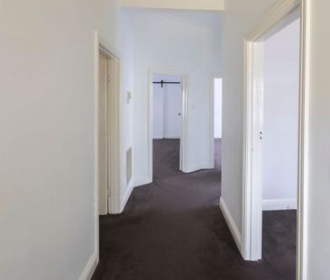 This beautifully presented, spacious three-bedroom home is ideally ... - Photo 1