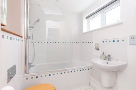 Two bedroom ground floor apartment with private rear garden and parking. - Photo 2