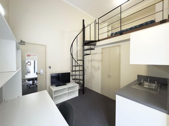 Loft style unit with portable ac - Photo 1