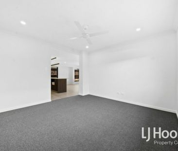 SLEEK & STYLISH NEAR NEW BUILD - GREAT SIZE BACKYARD! - Photo 6
