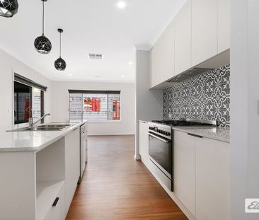 Spacious 4-Bedroom Family Home with Modern Comforts - Photo 6