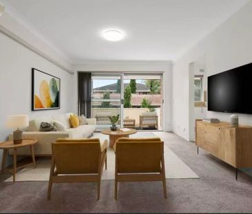 Well maintained| Bright| Spacious Two Bedroom In Ultra Convenient L... - Photo 2