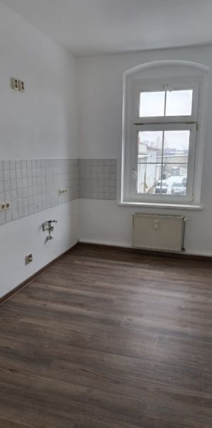 Frisch renovierte Wohnung im 1.Obergeschoss - Foto 1