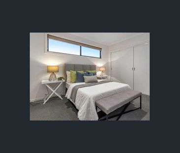 Contemporary Townhouse with Modern Comforts and Prime Location - Photo 3