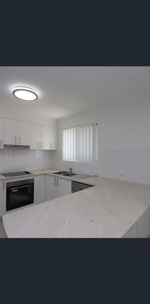 Modern 4-Bed Home in Eli Waters - Photo 1