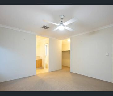 Spacious 4-Bedroom Family Home with Theatre Room & Solar Panels - Photo 6