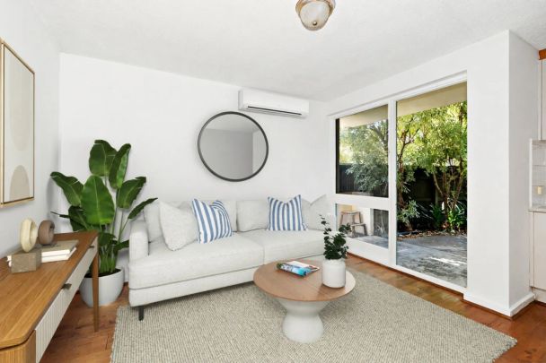 Low-Maintenance Apartment with Stunning Private Courtyard! - Photo 1