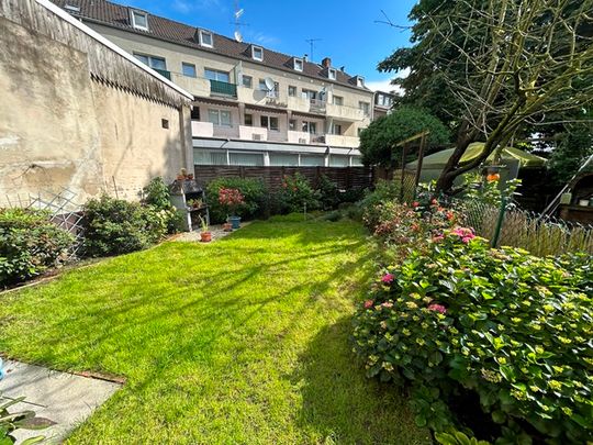 Helle 3 Zimmer Wohnung im Erdgeschoss mit großer Terrasse und Garten! - Foto 1