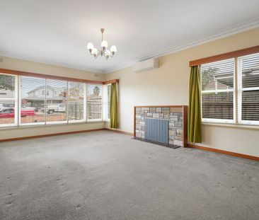 Charming Brick Veneer Home in the Heart of Belmont - Photo 1