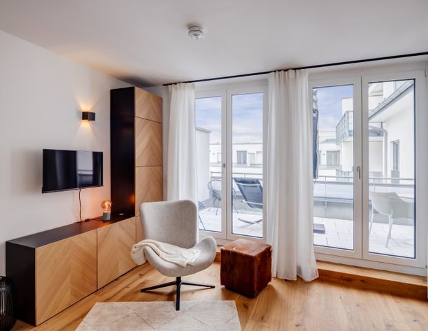 Nice roof-terrace apartment in new building for rent - Photo 1