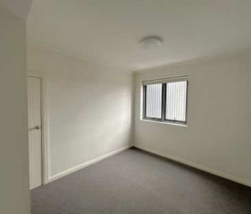 Brand new carpet, three bright rooms with windows, and two parking ... - Photo 2