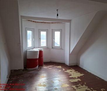 Helle Dachgeschosswohnung - Foto 1