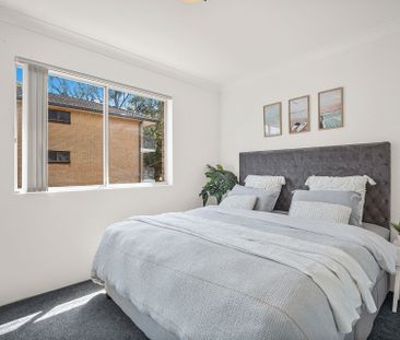 Conveniently Located 2-Bedroom Home with Garage & Modern Finishes - Photo 2