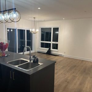 Grand condo lumineux 4 ½ au Faubourg Cousineau – Secteur recherché et paisible - Photo 2