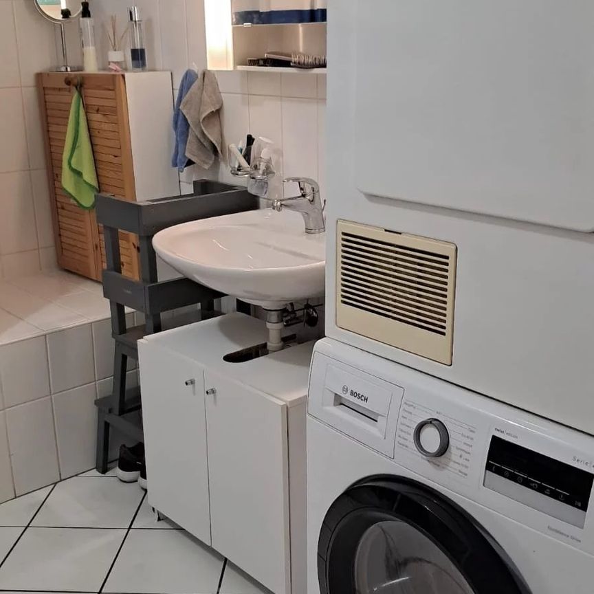 Appartement de 2,5 pièces au rez-de-chaussée - Photo 1