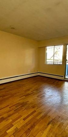 Spacious 1bed/1bath suite in Multifamily Bldg - Photo 1