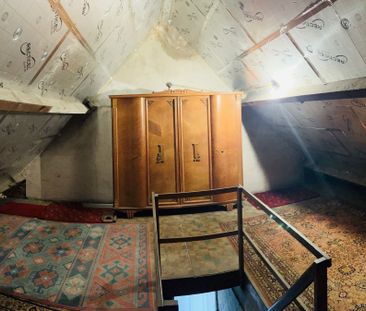 Rijwoning met 3 slaapkamers, tuin en zolder - Photo 4
