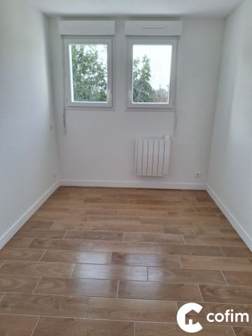 Appartement T3 avec jardin et garage - Photo 3