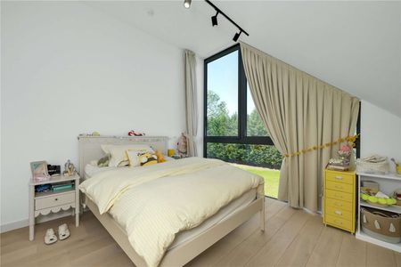 A modern and architecturally designed house of the highest order situated on an historic private country estate with wonderful rural views. - Photo 4