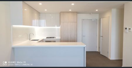 Prime location Spacious 2 Bedroom with District Views - Photo 3