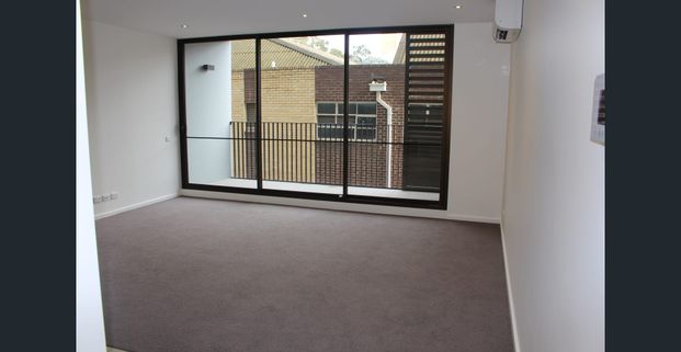 Secure Apartment With Spacious Livingroom And Balcony! - Photo 1