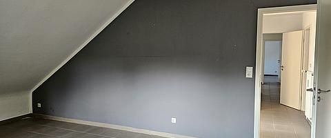 Moderne Dachgeschosswohnung in ruhiger Lage - Foto 1