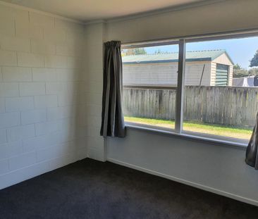 Tidy two bedroom unit with open plan kitchen, lounge and dining. - Photo 1