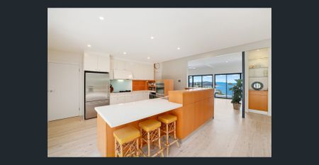 Furnished Beachside Retreat with Breathtaking Ocean Views - Photo 3