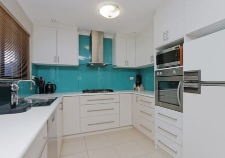 Easily Maintained Property with Spacious Backyard - Photo 3