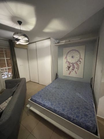 Location Appartement 1 pièce 26m² LA POSSESSION 97419 - Photo 2