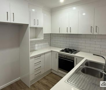 Spacious Townhouse in a Convenient Albion Park Location - Photo 1