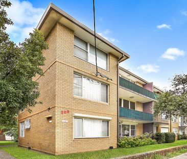 GROUND FLOOR TWO BEDROOM APARTMENT WITH BALCONY AND LOCK UP GARAGE - Photo 2