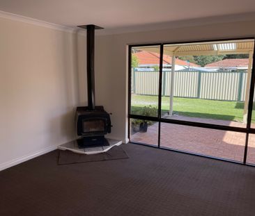 Relaxed living with a spacious backyard. - Photo 1