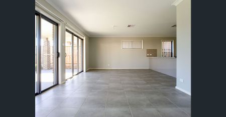 Modern 4-Bedroom Family Home in Sought-After Edmondson Park - Photo 3