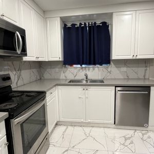Newly renovated large bright 2 bedroom unit in a very quiet residential area - Photo 2