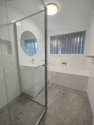 Freshly Renovated Family Unit - Modern Living with Convenience - Photo 1