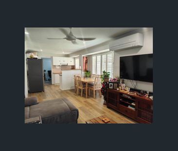 Modern 2 Bedroom Duplex with Pool & Secure Yard! - Photo 1